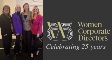 photo of Barb Stinnett and colleagues at WCD event in Minneapolis, with WCD logo at right